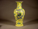 Kangxi lemon yellow baluster vase decorated with three Imperial five clawed dragons