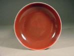 An Imperial Daoguang mark & period Copper Red Saucer